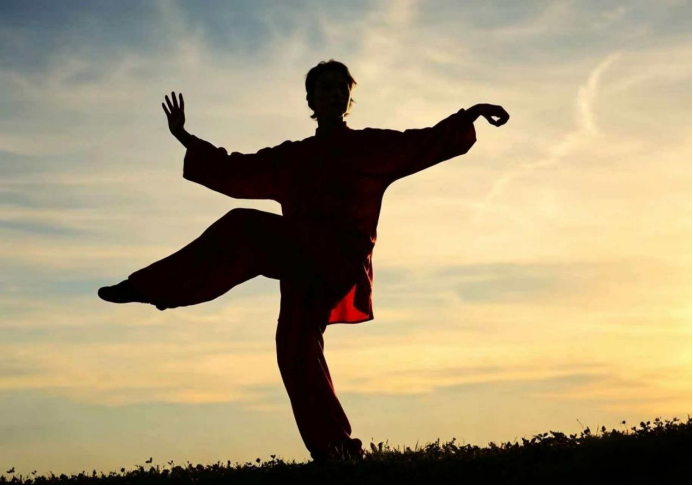 Taichi practice as moving meditation in a mountain campus setting Taichi practice as moving meditation in a mountain campus setting
